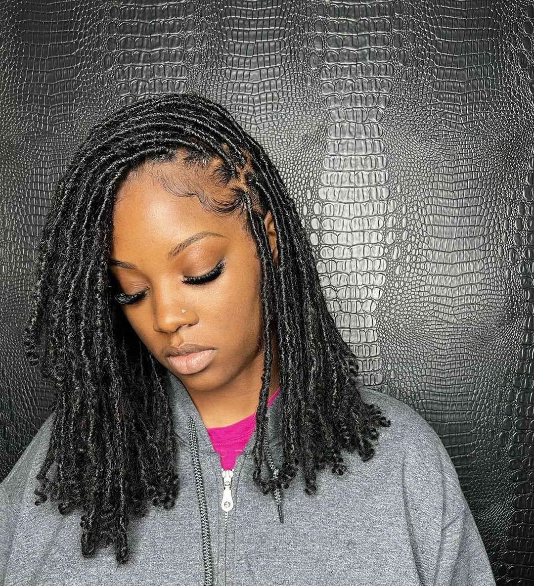 locs hairstyles for black women Side-Parted Layered Locs With Defined Texture