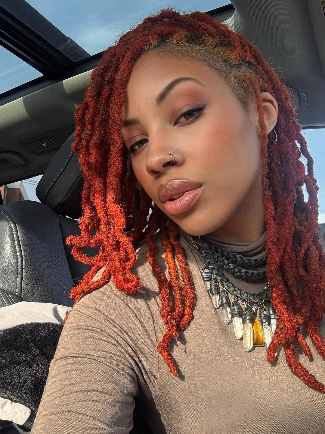 locs hairstyles for black women Bold Copper Red Locs Full of Confidence