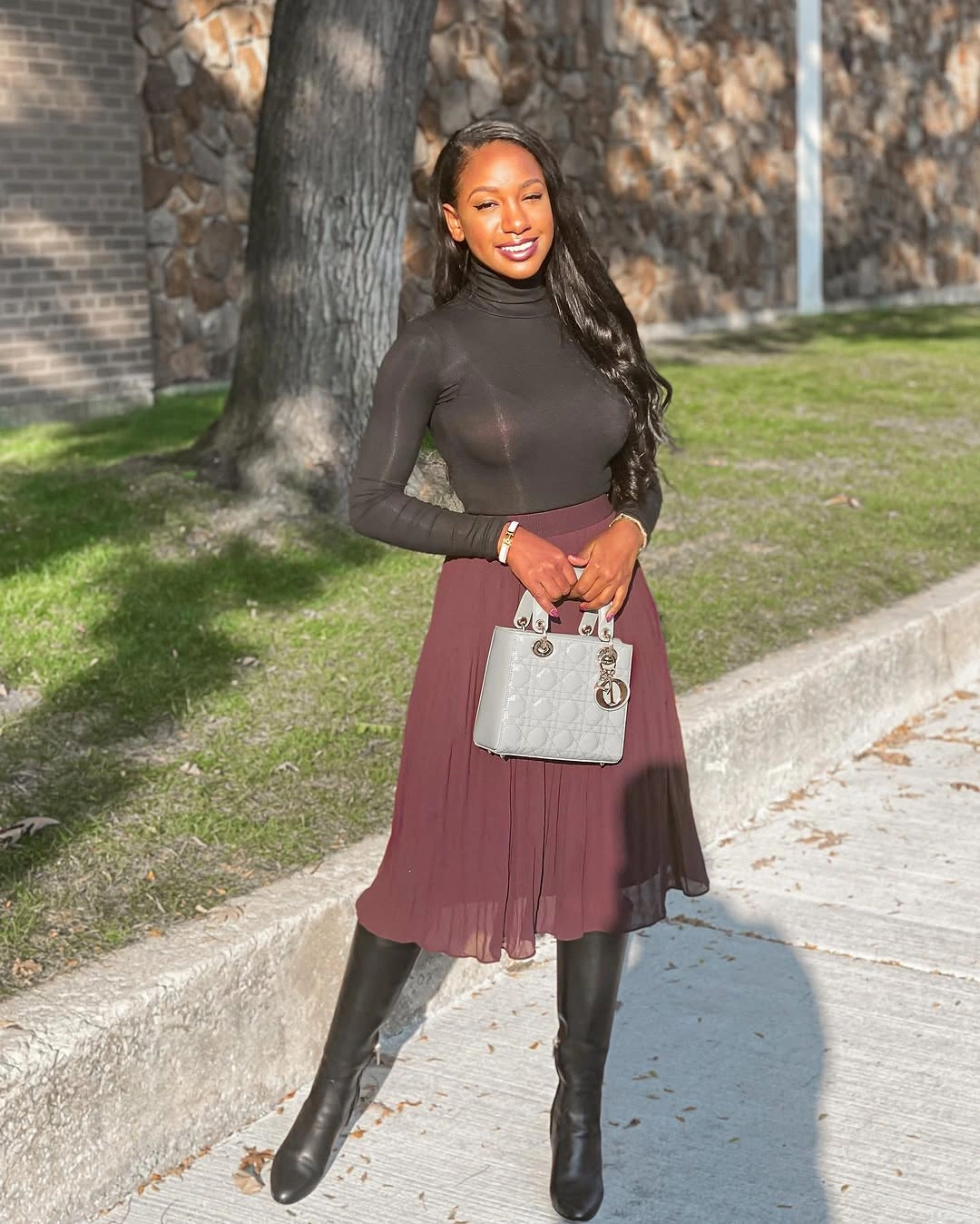 midi skirt fall outfit 2026 Deep Red Pleated Midi Skirt With Classic Black Styling