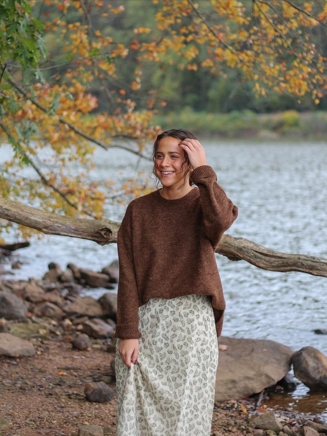 midi skirt fall outfit 2026 Cozy Brown Sweater And Floral Midi Skirt For Slow Fall Days