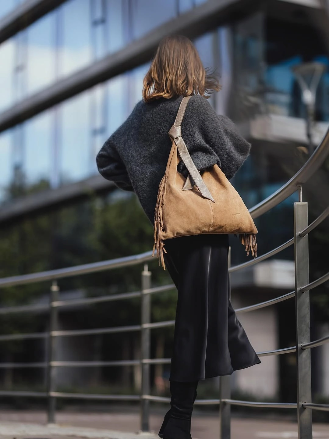 midi skirt fall outfit 2026 Cozy Knit And Black Satin Midi Skirt For Minimal Fall Style