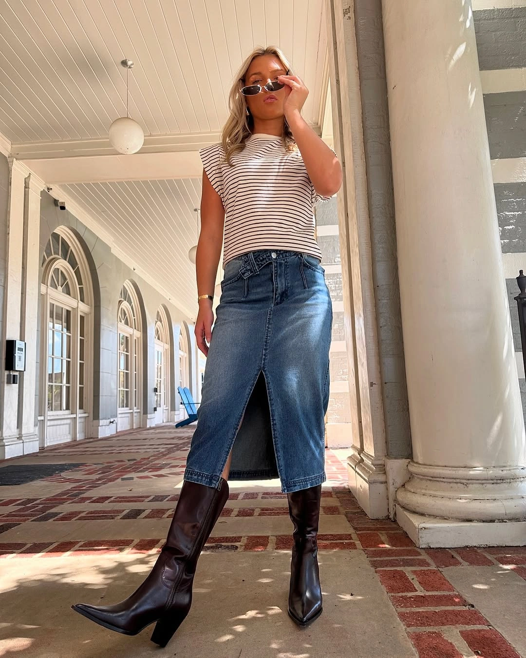 midi skirt fall outfit 2026 Blue Denim Midi Skirt With Classic Fall Boots