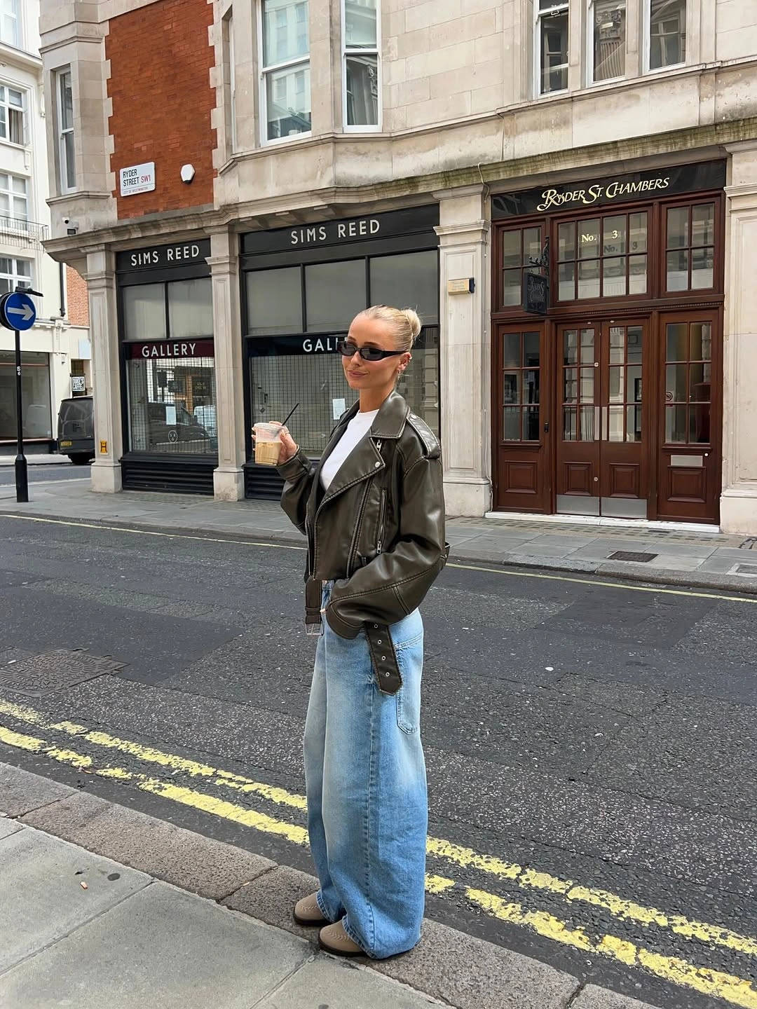 September fashion trends 2026 Black Leather Jacket With Wide Denim