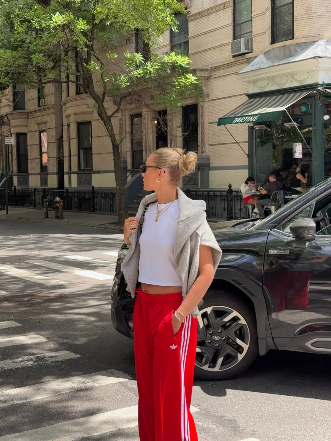 September fashion trends 2026 Red Track Pants With A White Layered Top