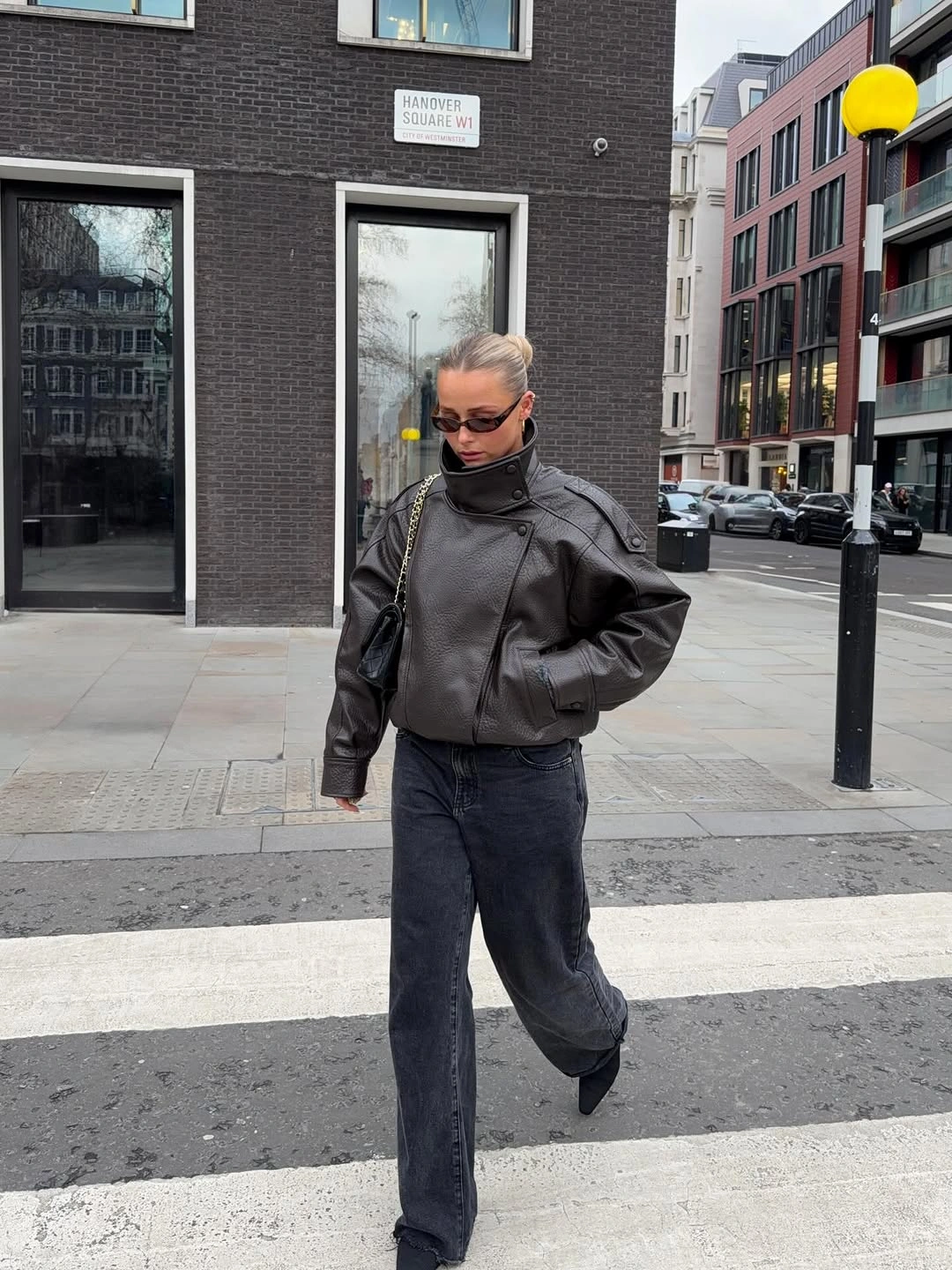 September fashion trends 2026 All-Black Leather And Knit Street Look
