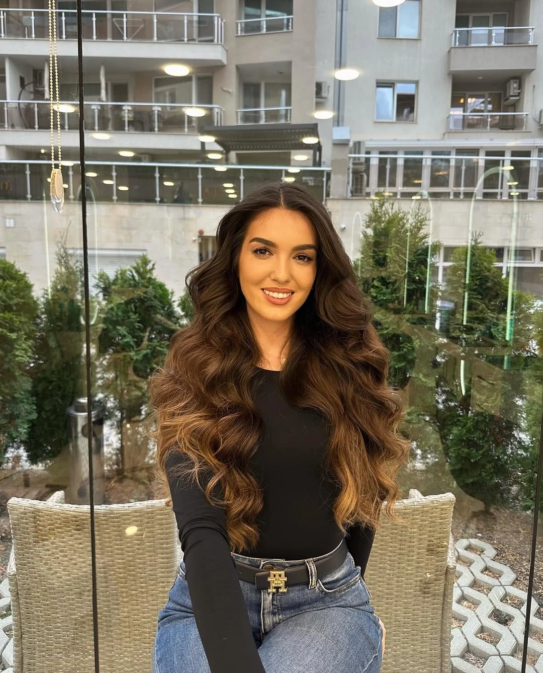 September hairstyles ideas 2026 Glossy Brunette Waves With Center Volume