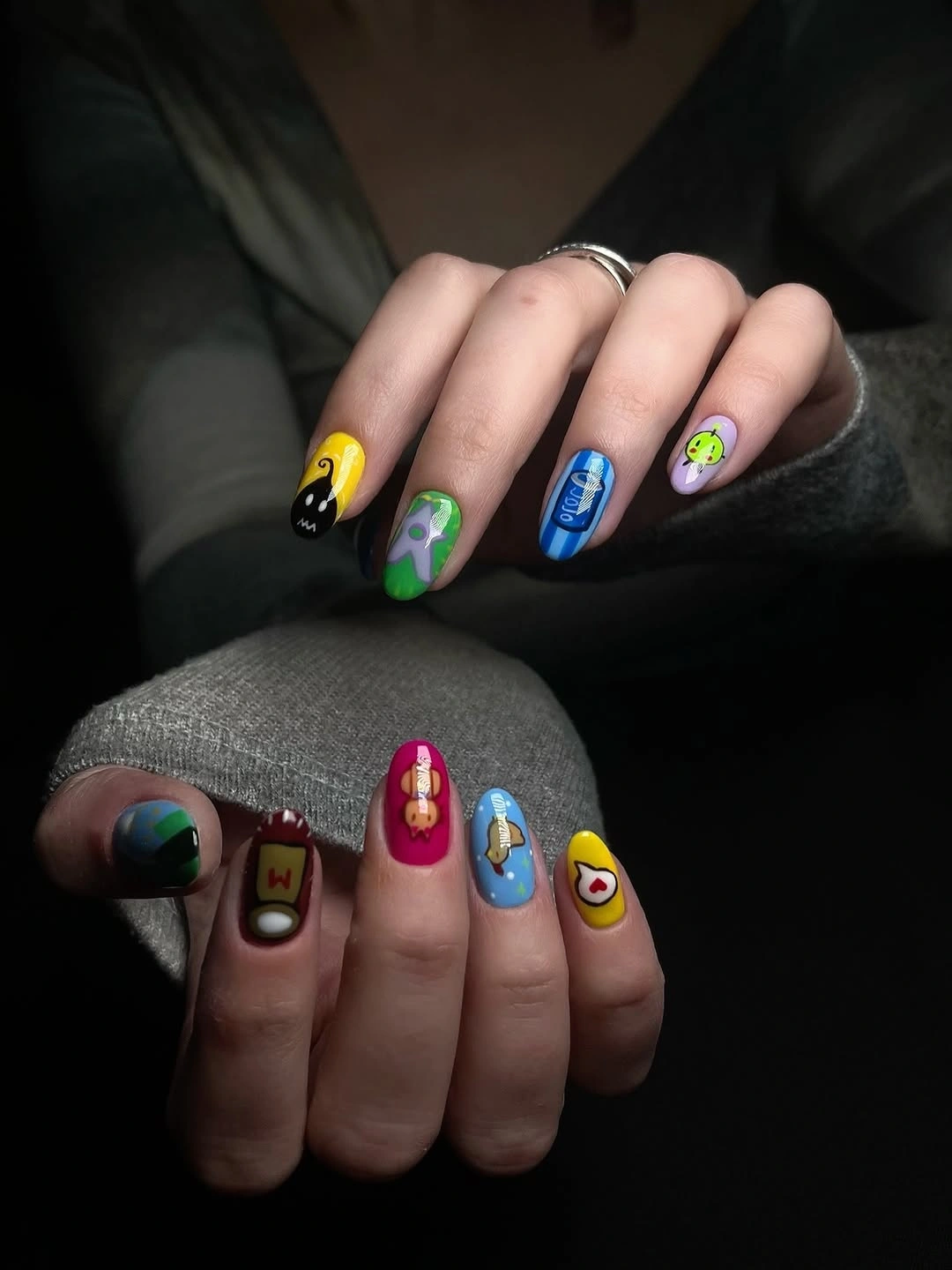 September nail art ideas 2026 Playful Multicolor Short Nails With Graphic Icons