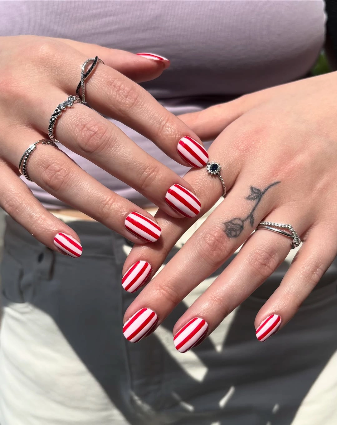 September nail art ideas 2026 Red And White Candy Stripe Almond Nails