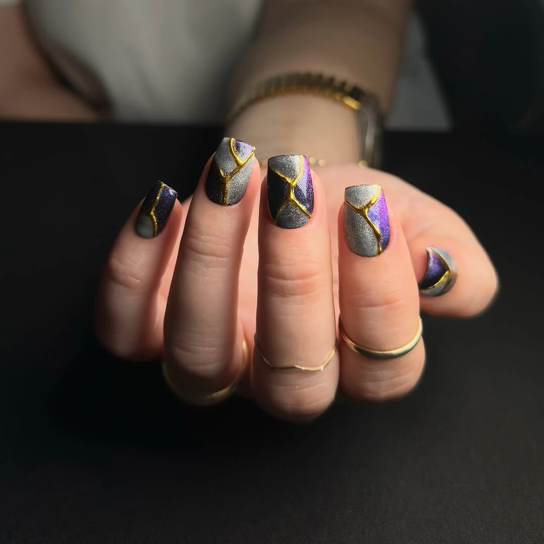 September nail art ideas 2026 Black Nails With Smoky Orange Geometric Swirls
