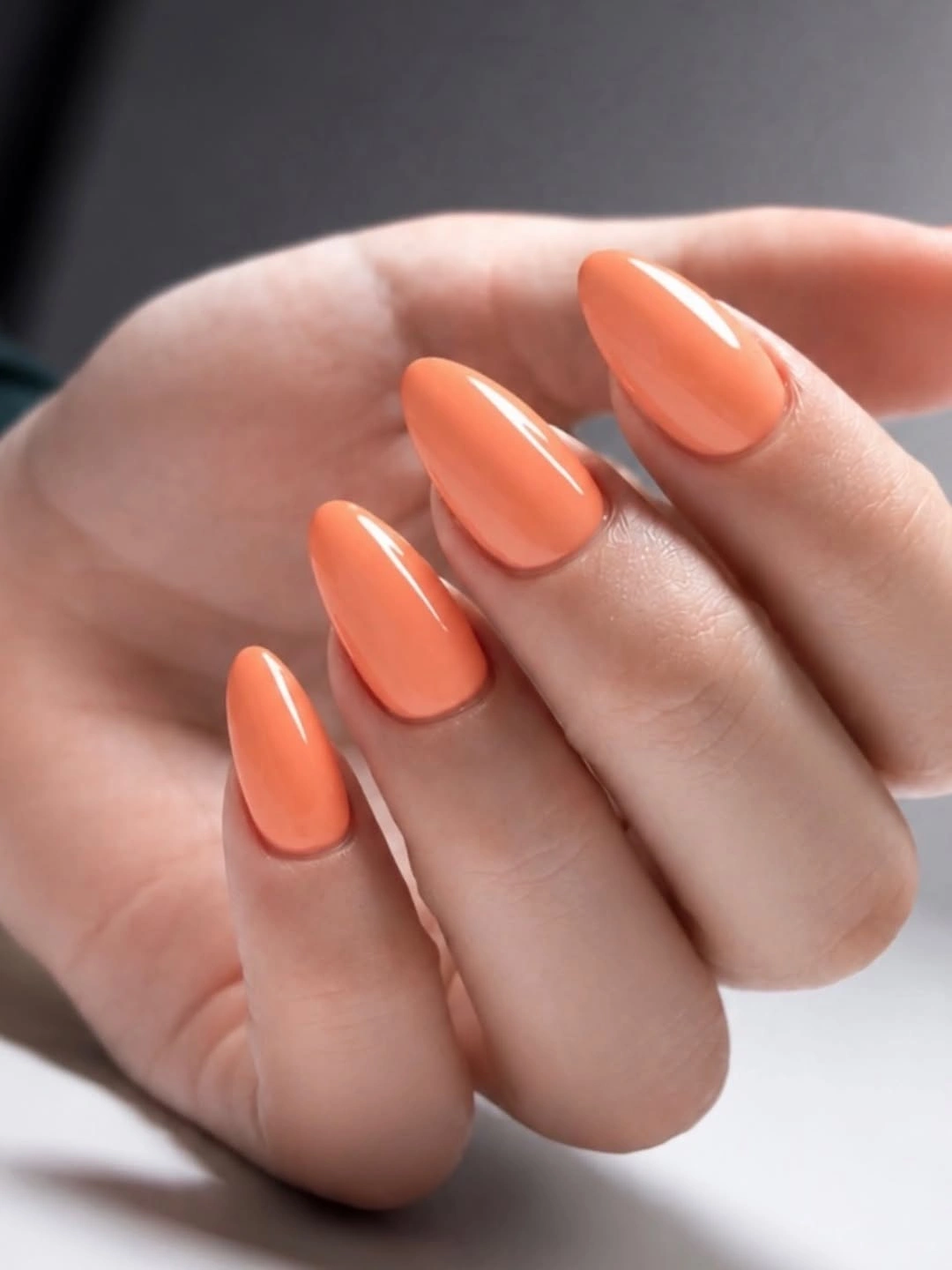 September nail art ideas 2026 Peach Almond Nails With Glossy Solid Color