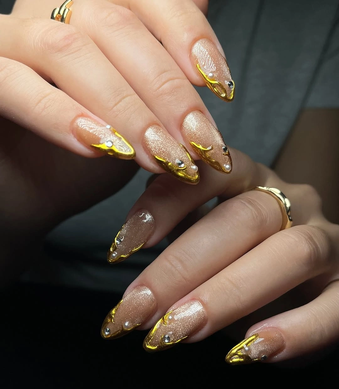 September nail art ideas 2026 Nude Almond Nails With Gold Foil French Tips