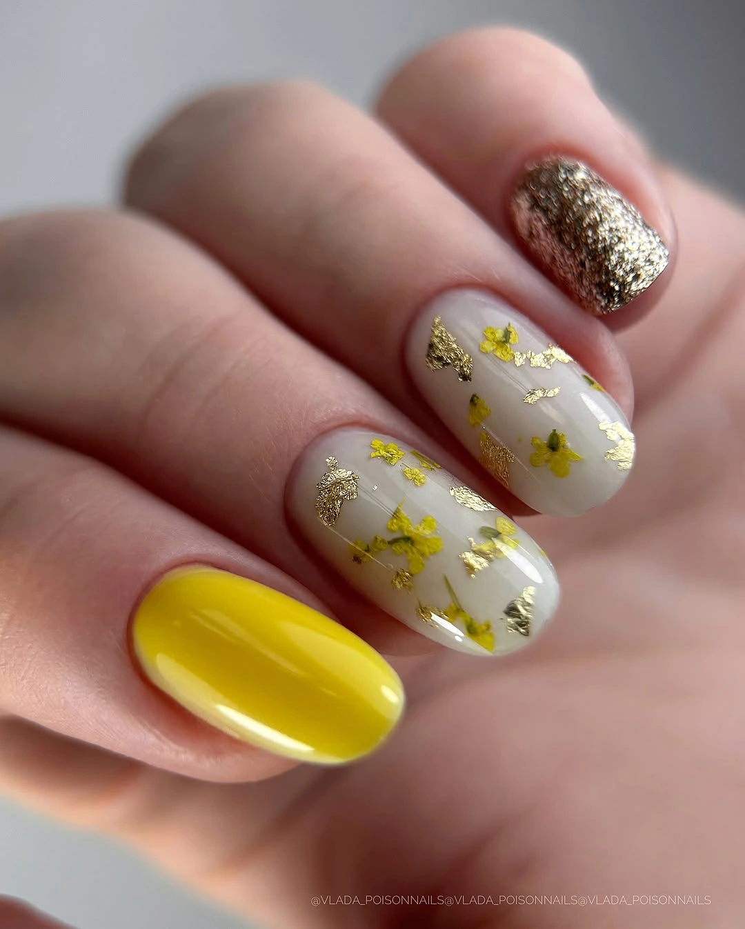 September nail designs 2026 Yellow Nails With Gold Foil And Glitter Accents