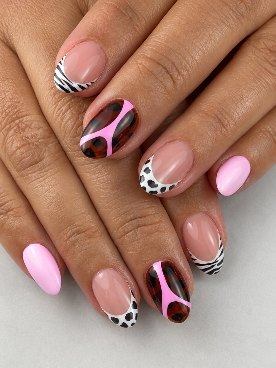 September nail designs 2026 Pink Nails With Zebra Spots And Abstract Swirls
