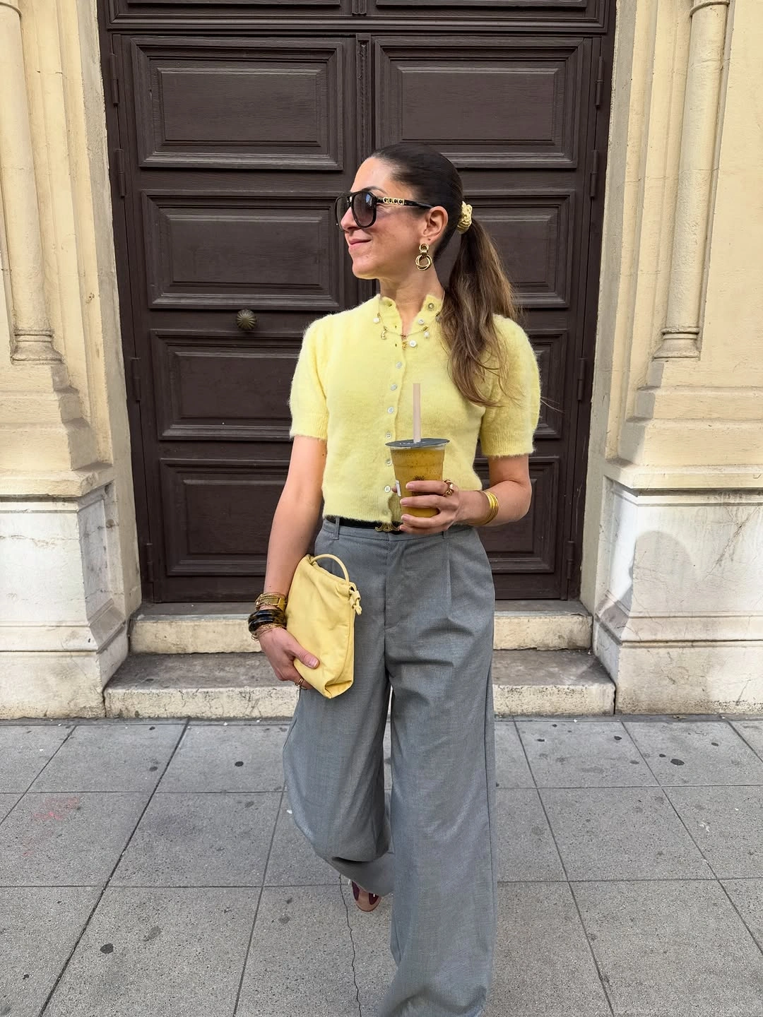 September outfits ideas 2026 Yellow Polo With Gray Pleated Trousers