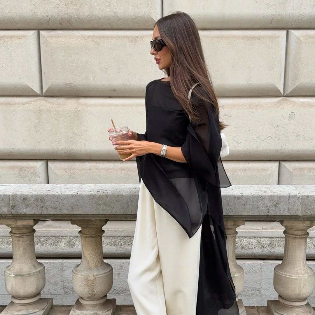 September outfits ideas 2026 Asymmetric Black Top With Wide Cream Trousers