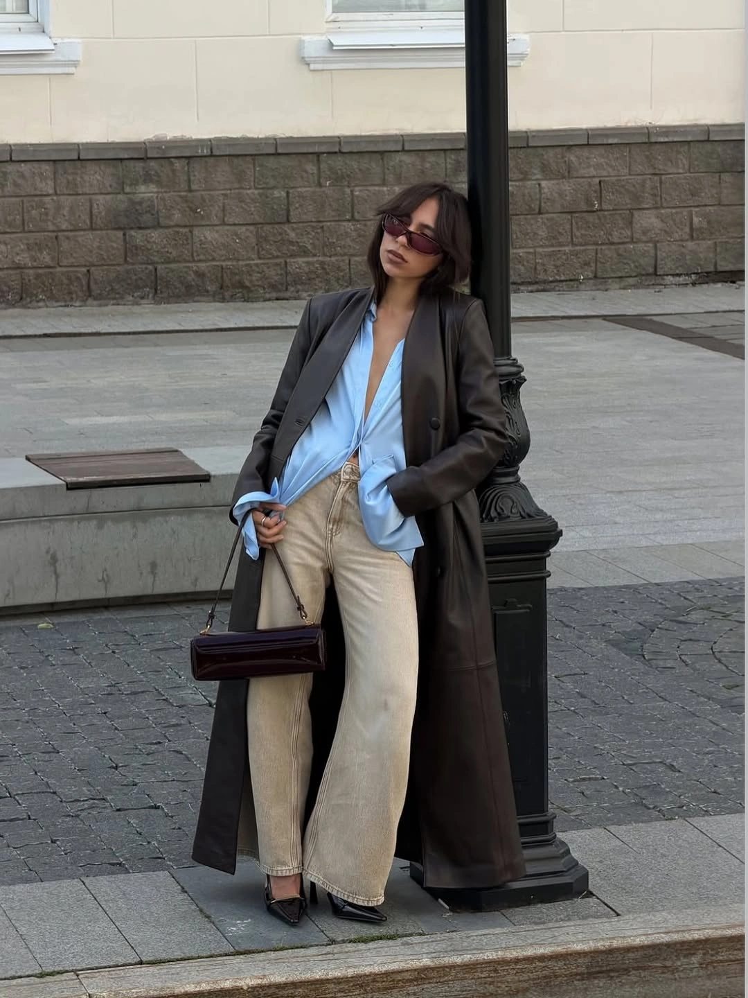 September outfits ideas 2026 Long Dark Leather Layer Over Soft Blue Shirting