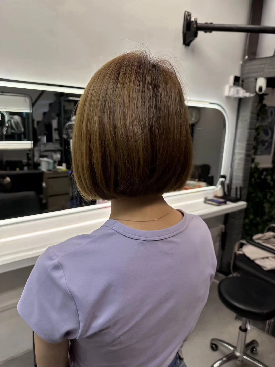 short bobbed hairstyle Rounded Classic Bob with Soft Volume at the Back