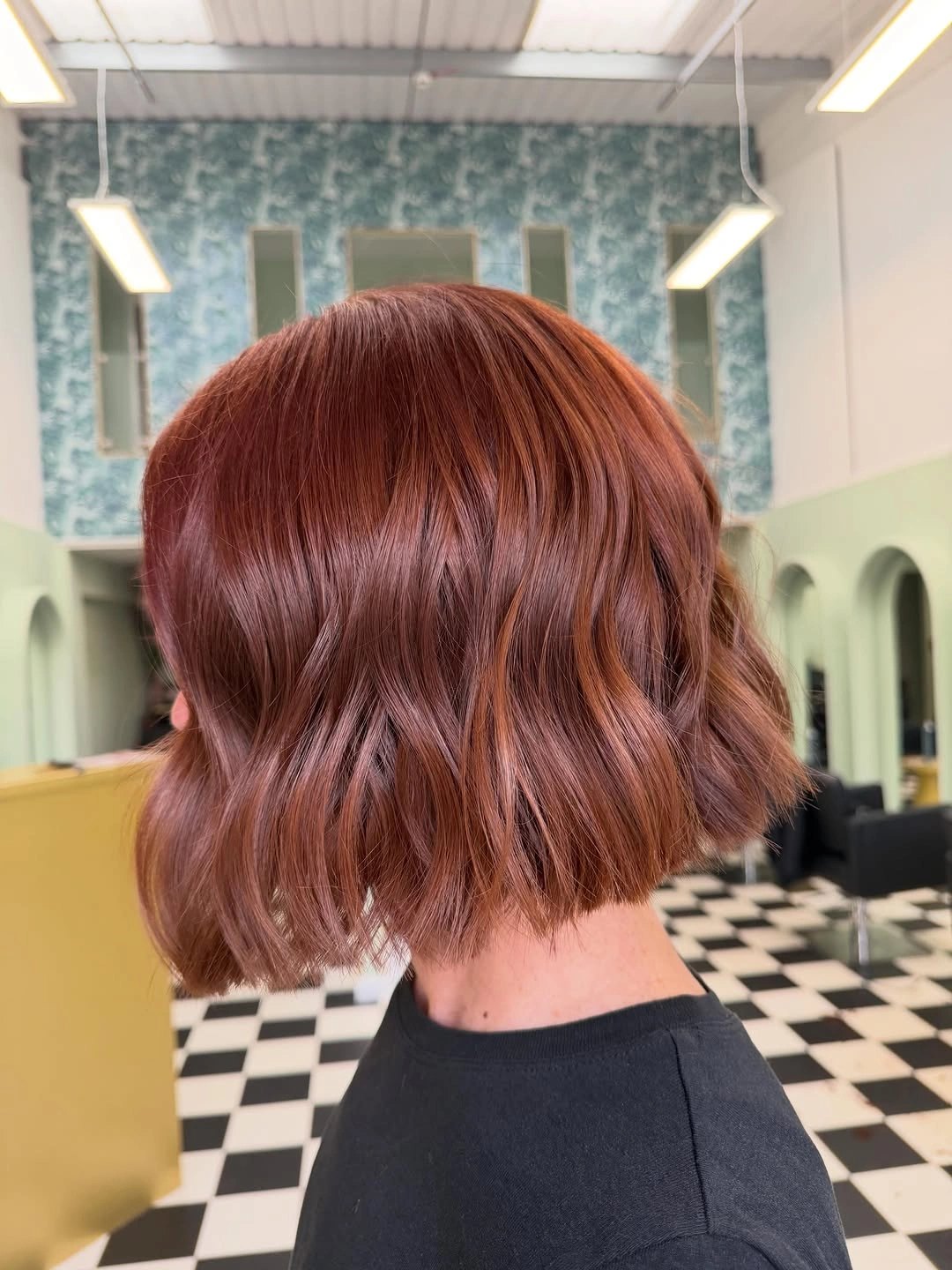 short bobbed hairstyle Soft Copper Waves on a Modern Bob