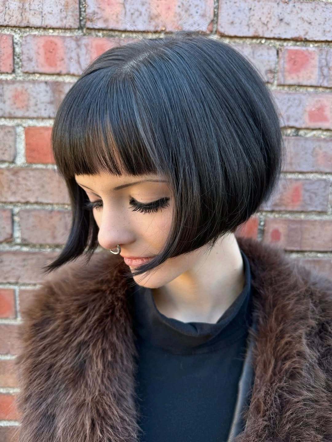 short bobbed hairstyle Sculpted French Bob with Blunt Bangs
