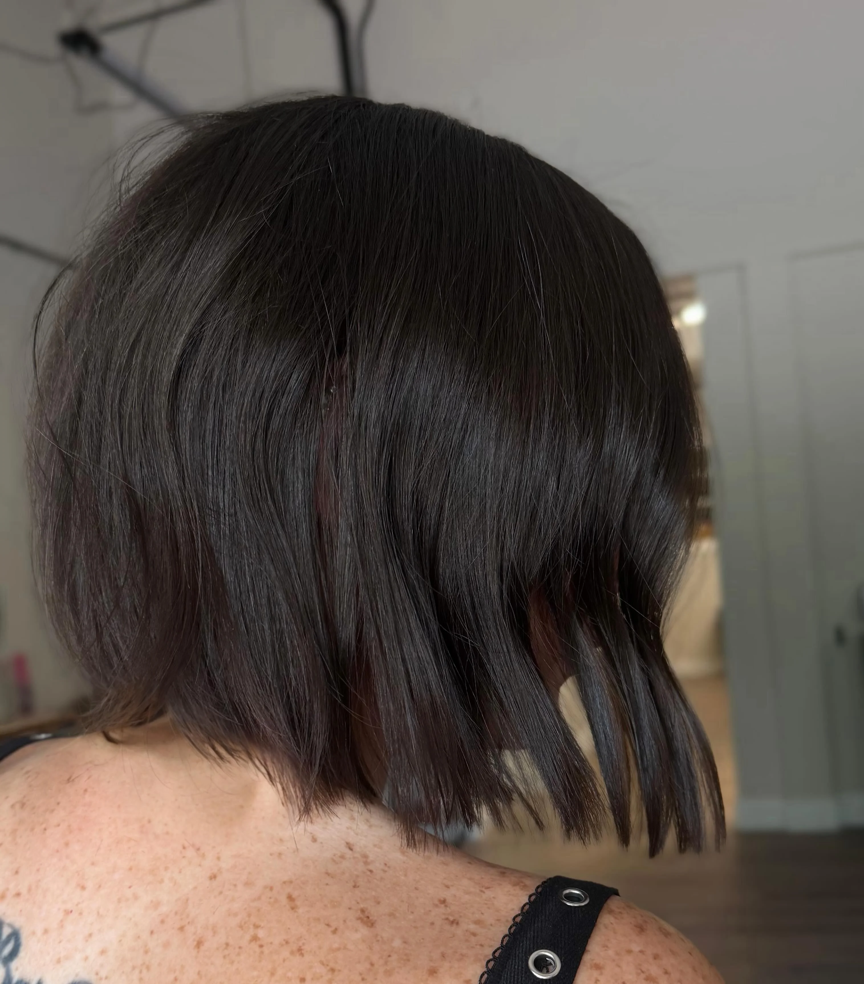 short bobbed hairstyle Glass Brunette Bob with Feather-Light Movement