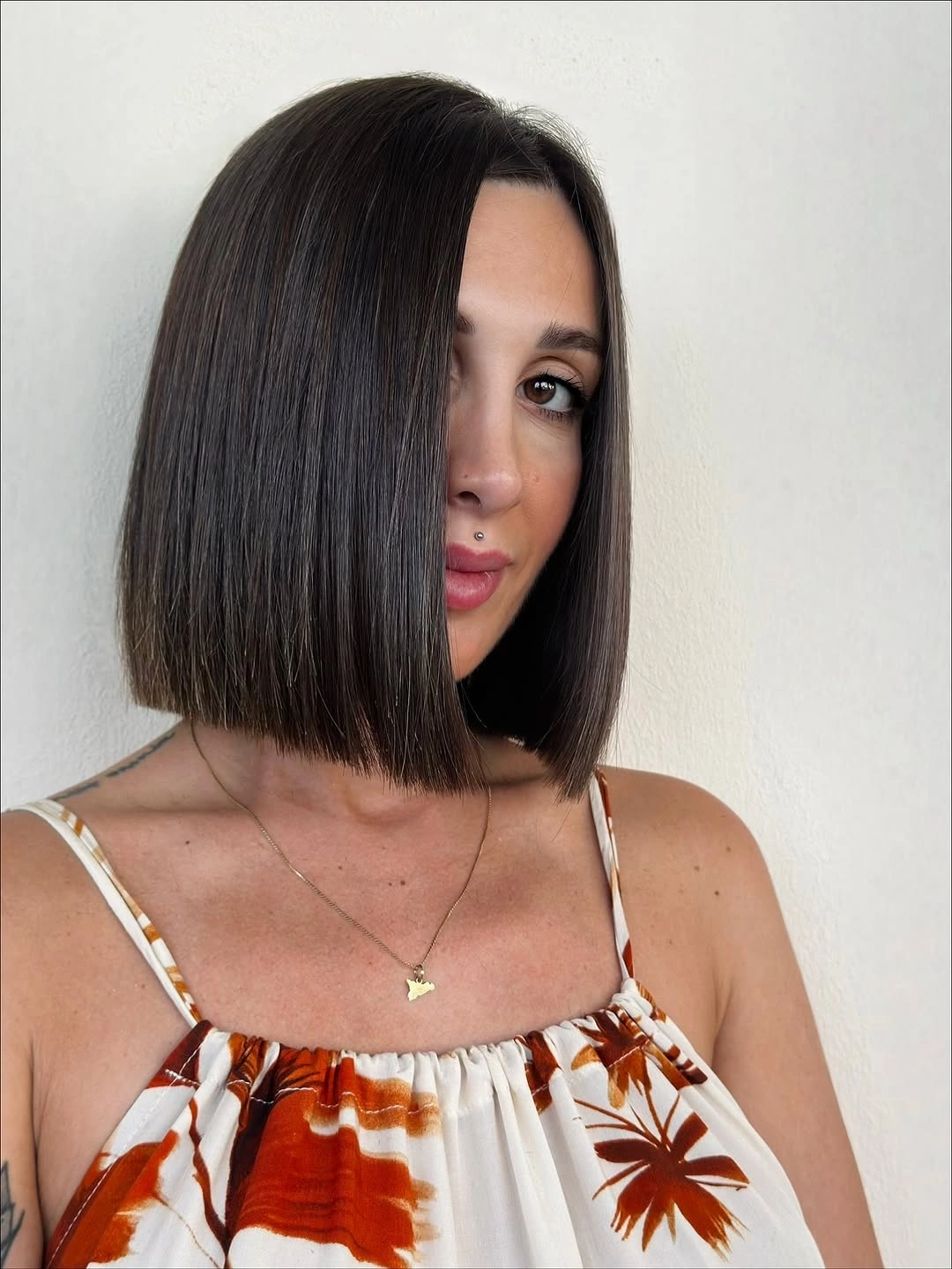short bobbed hairstyle Classic Precision Bob with a Soft Side Part