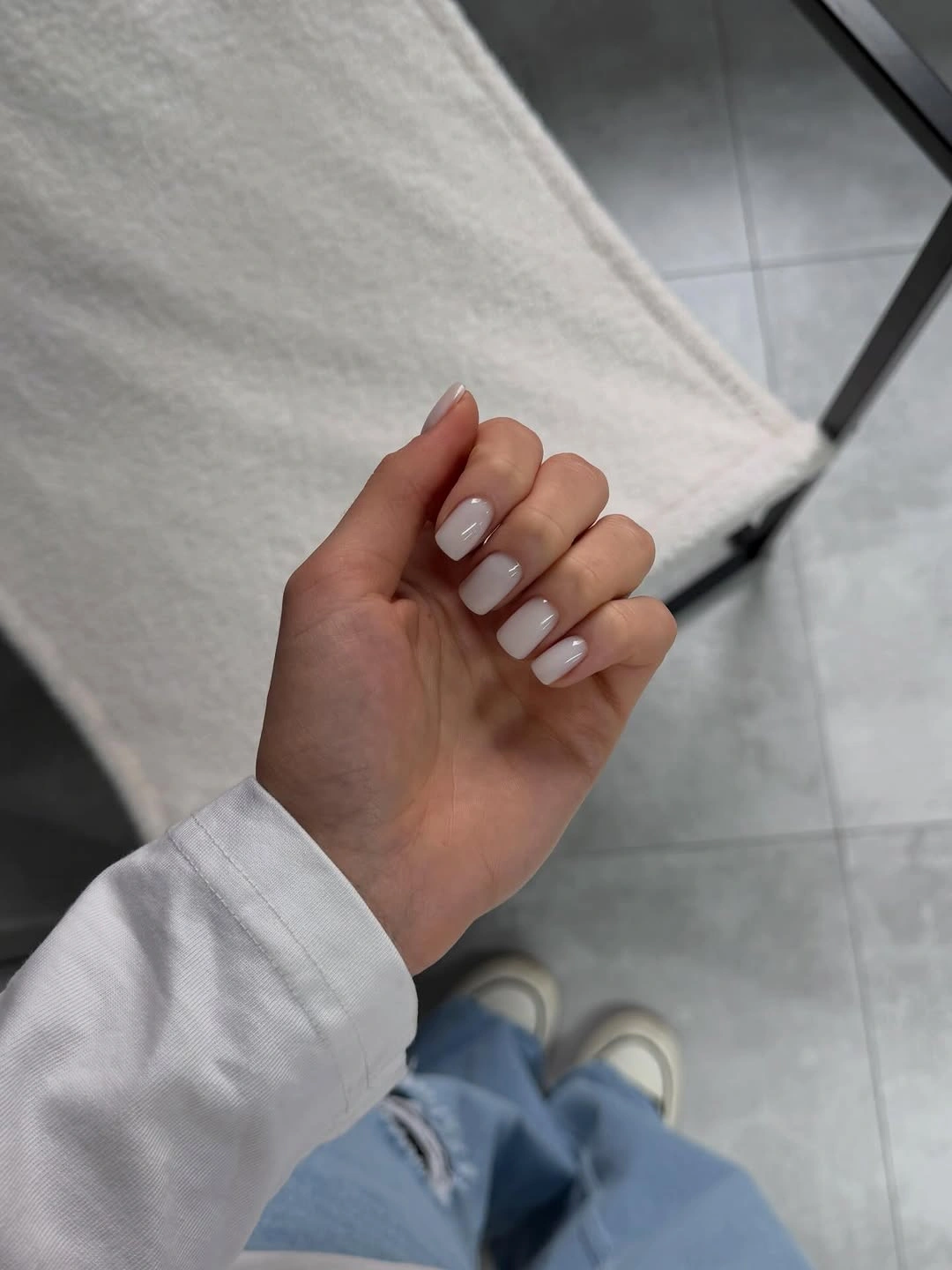 clean milky white medium almond nails with smooth finish