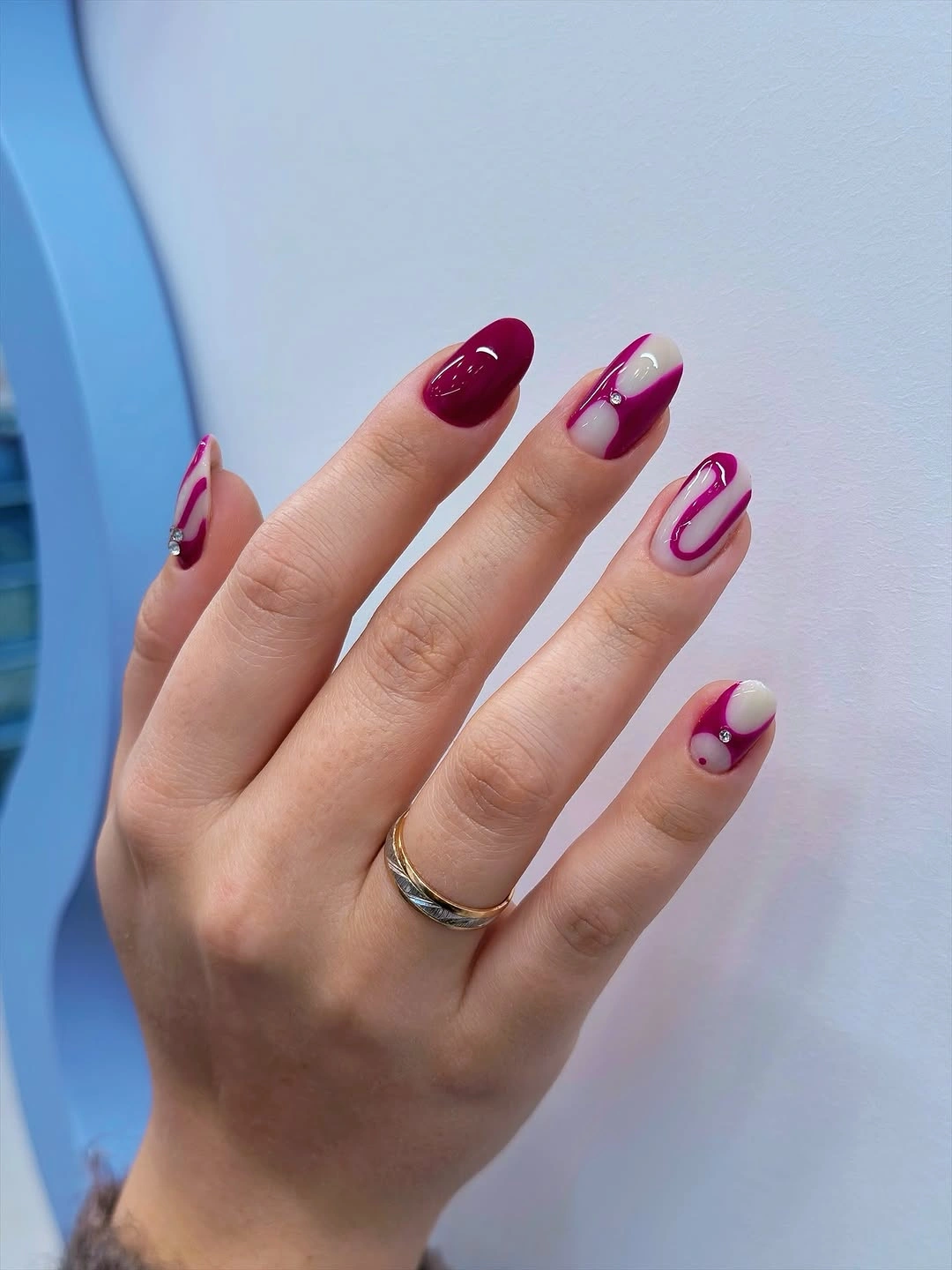 plum French almond nails with pink red contrast accents
