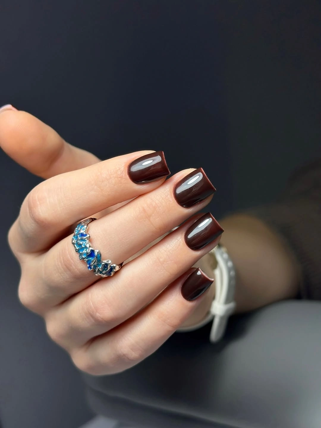 Medium square nails in clean glossy cocoa brown
