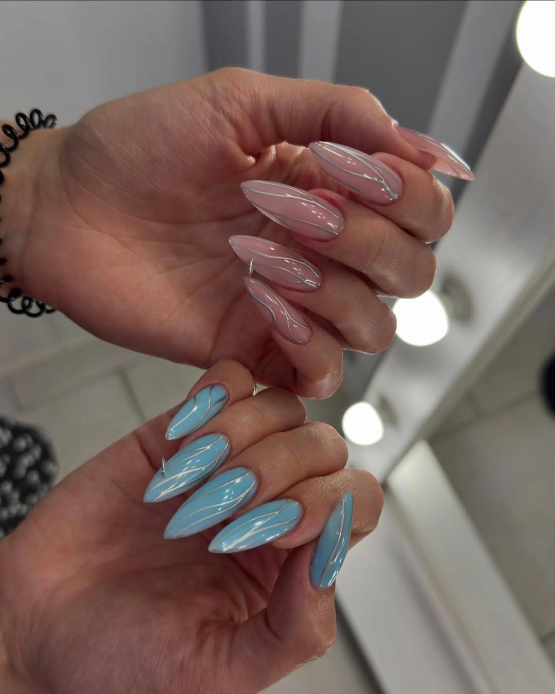 Blue and blush pointed nails with fine lines