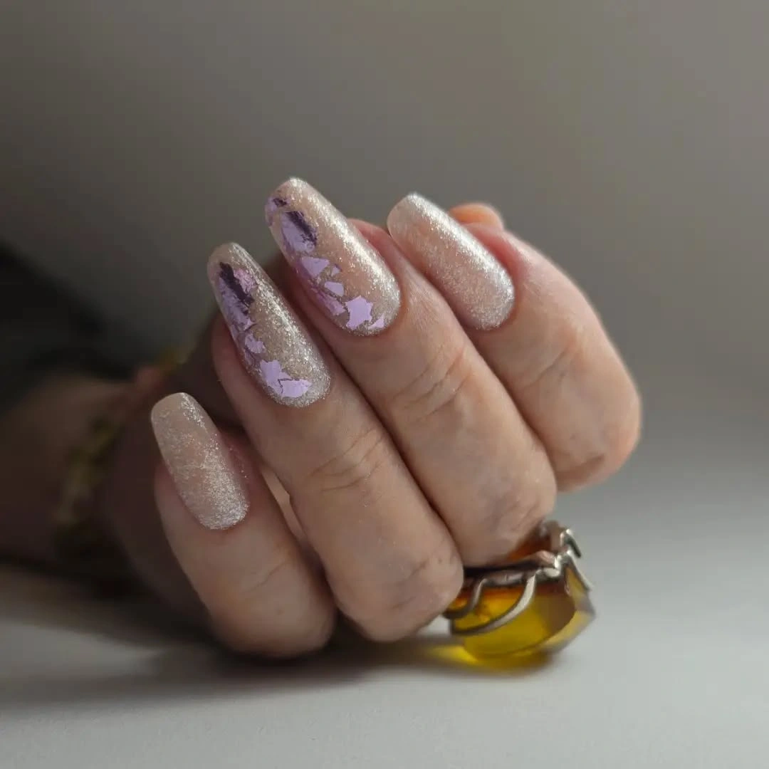 Champagne shimmer nails with lavender foil accents