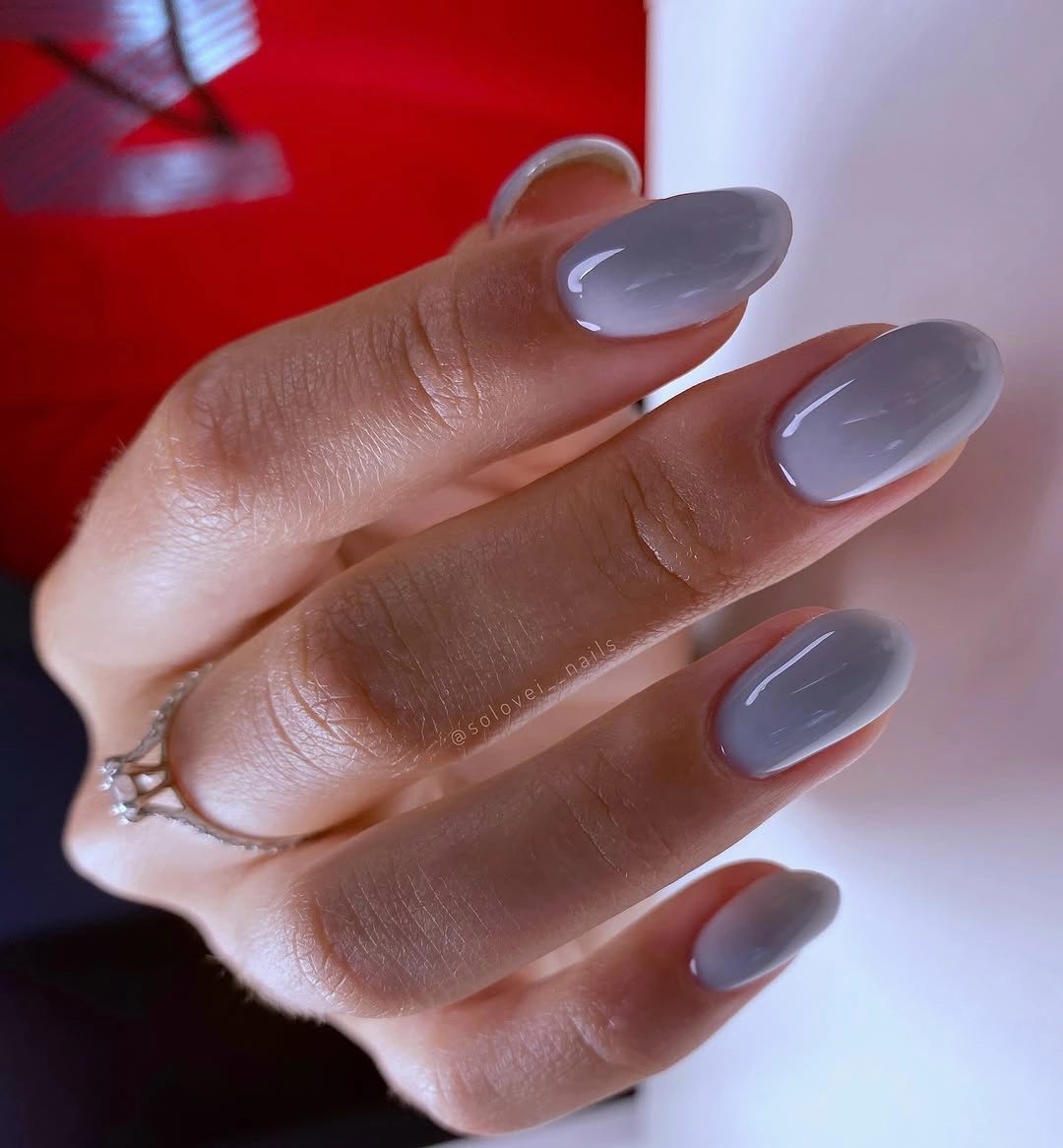 Glossy smoky gray almond nails