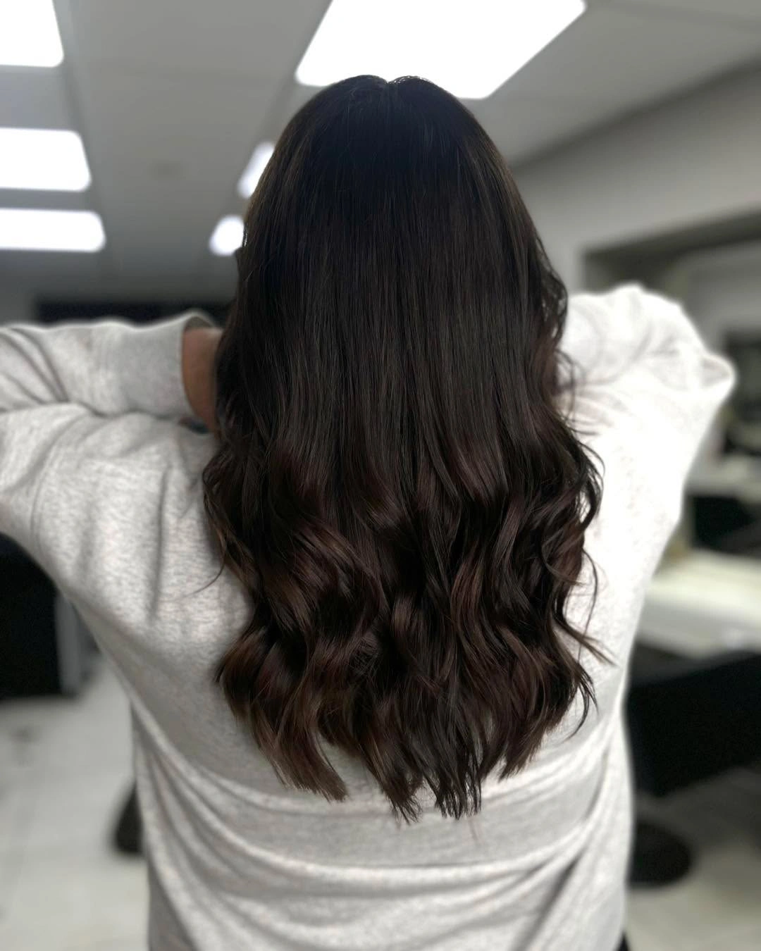 Long espresso brunette hair with controlled low waves