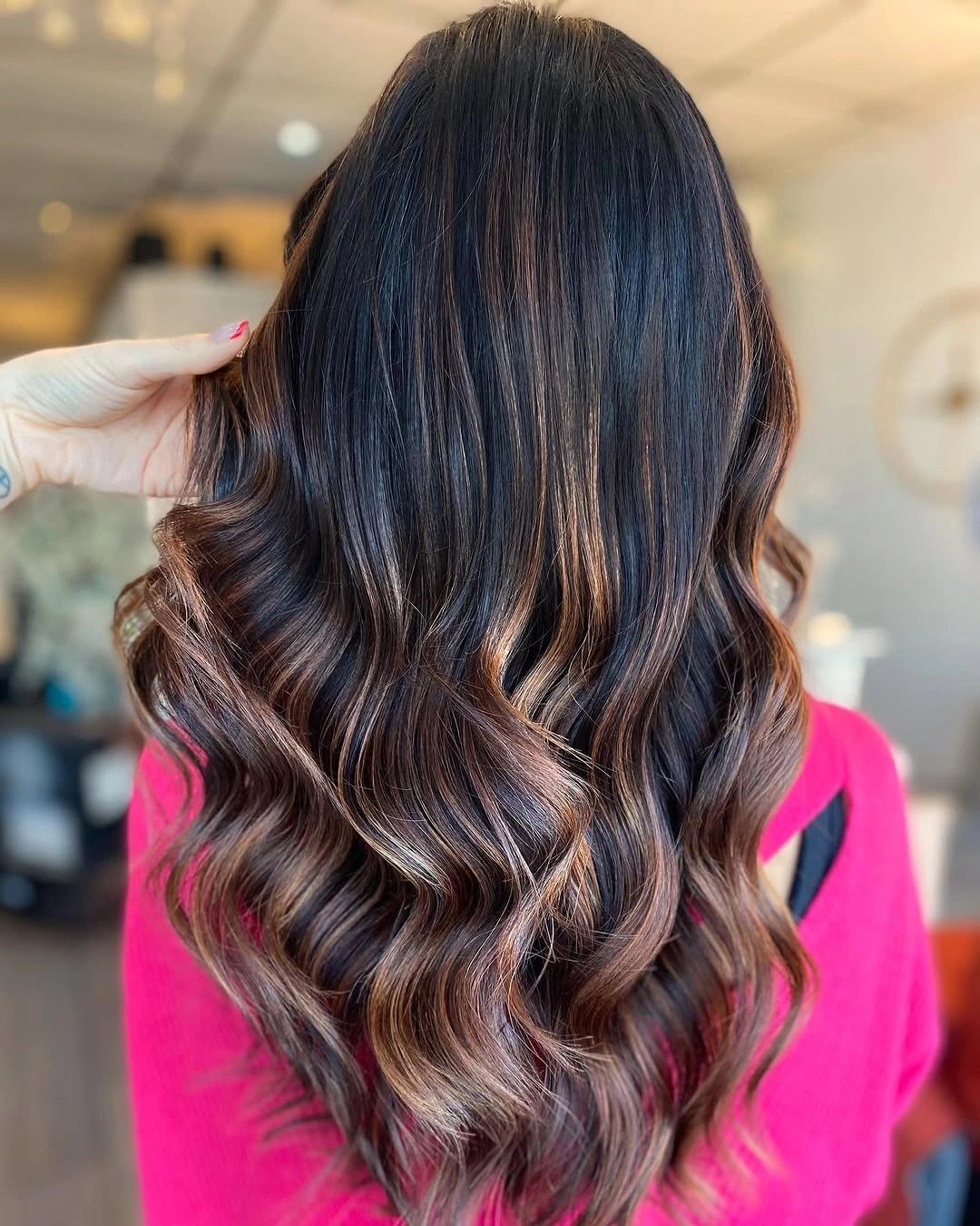 Cool dark brown waves with reflective blue-black depth