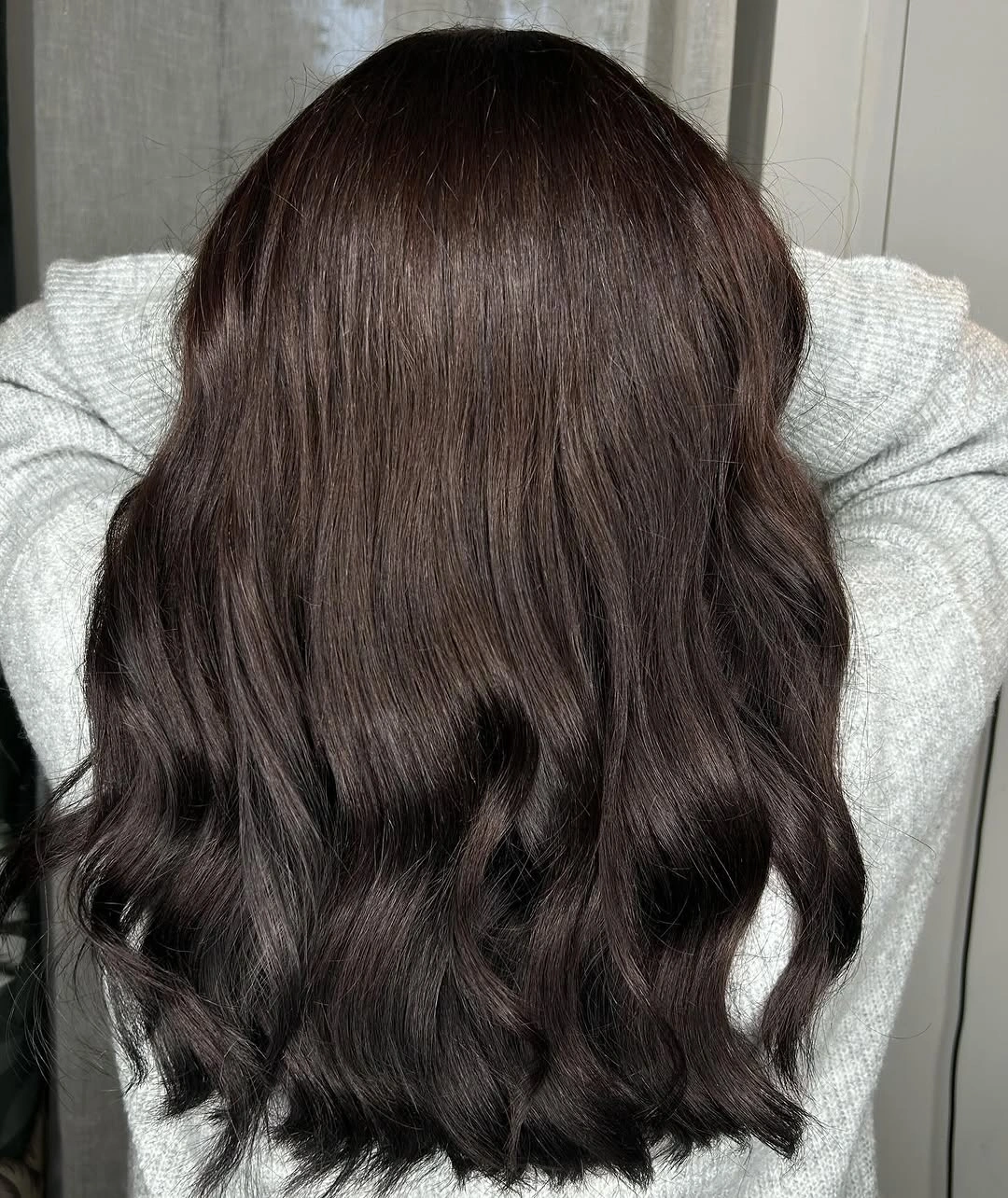 Long dark brown hair with smooth flowing waves