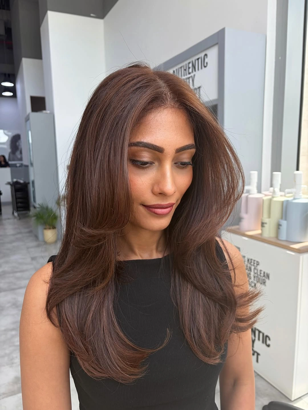 Warm auburn brown layers with a lifted face-framing front