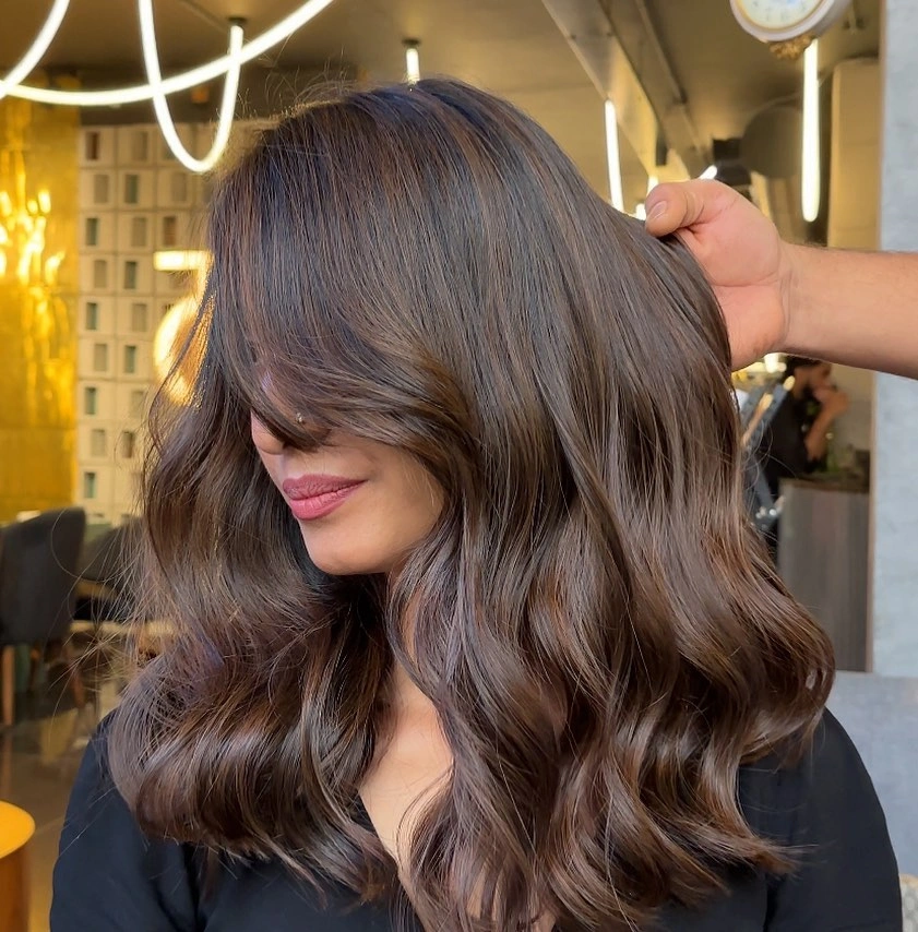 Medium dark brown waves with soft face framing