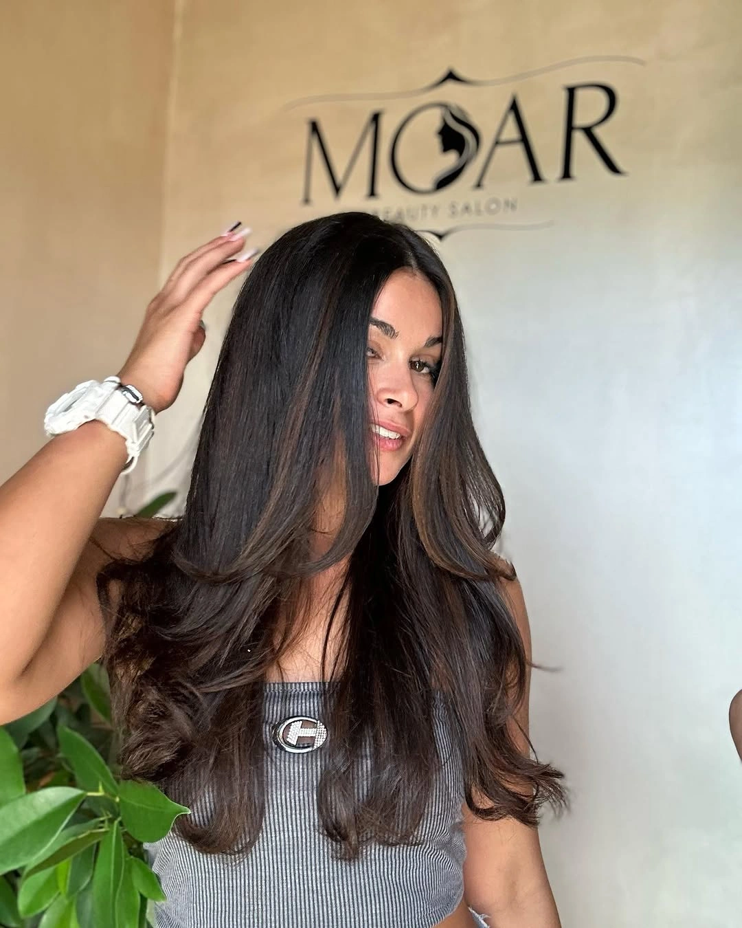 Long dark brunette with smooth roots and soft lower waves