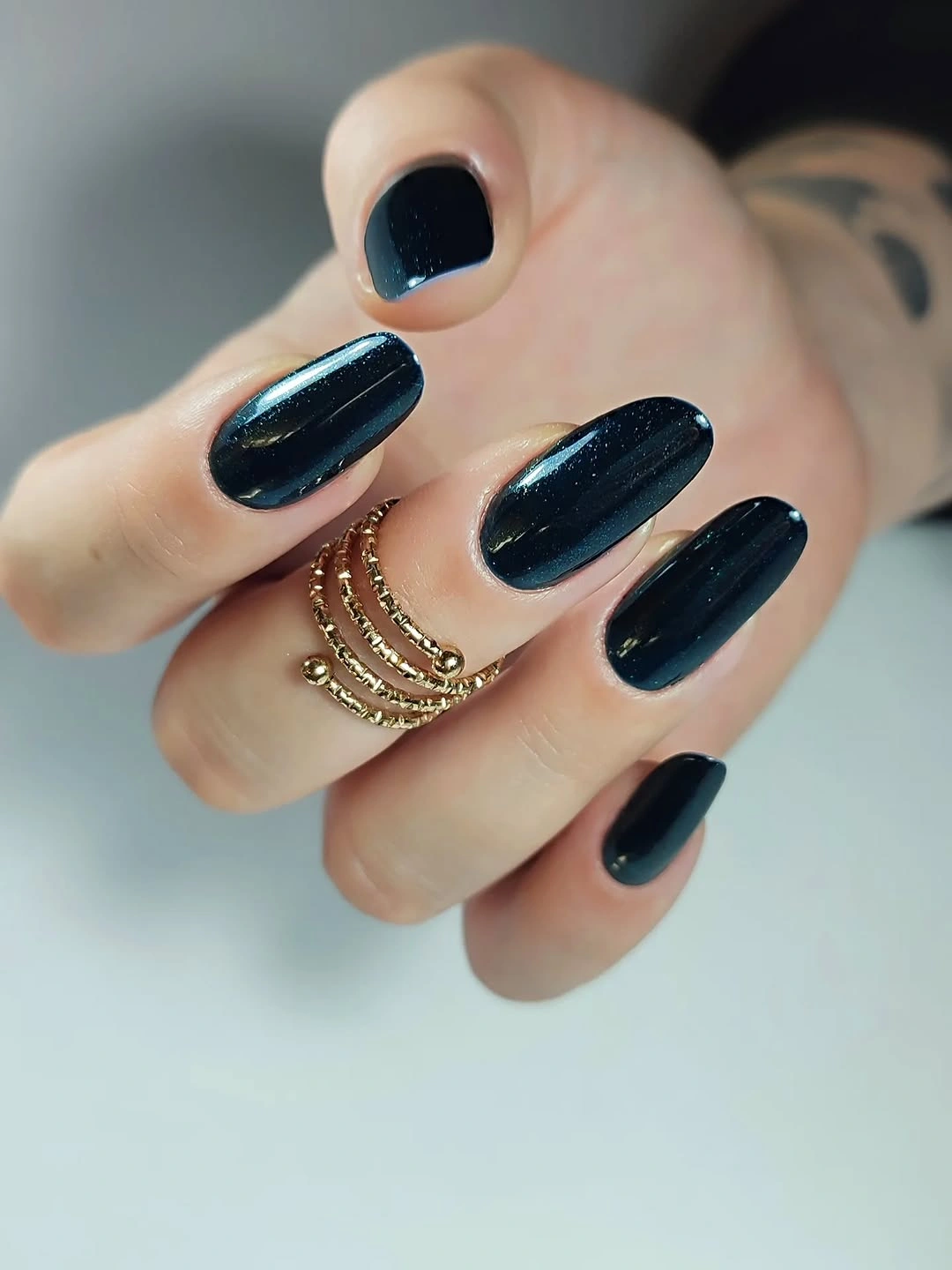 Medium glossy deep teal oval nails