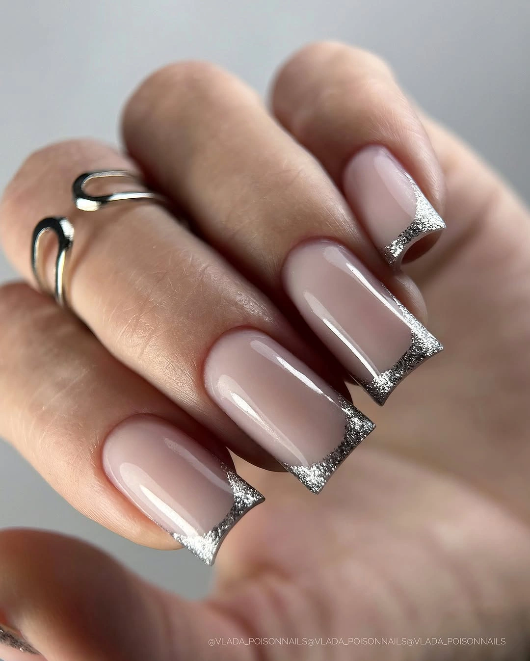 pale pink coffin nails finished with silver glitter edges