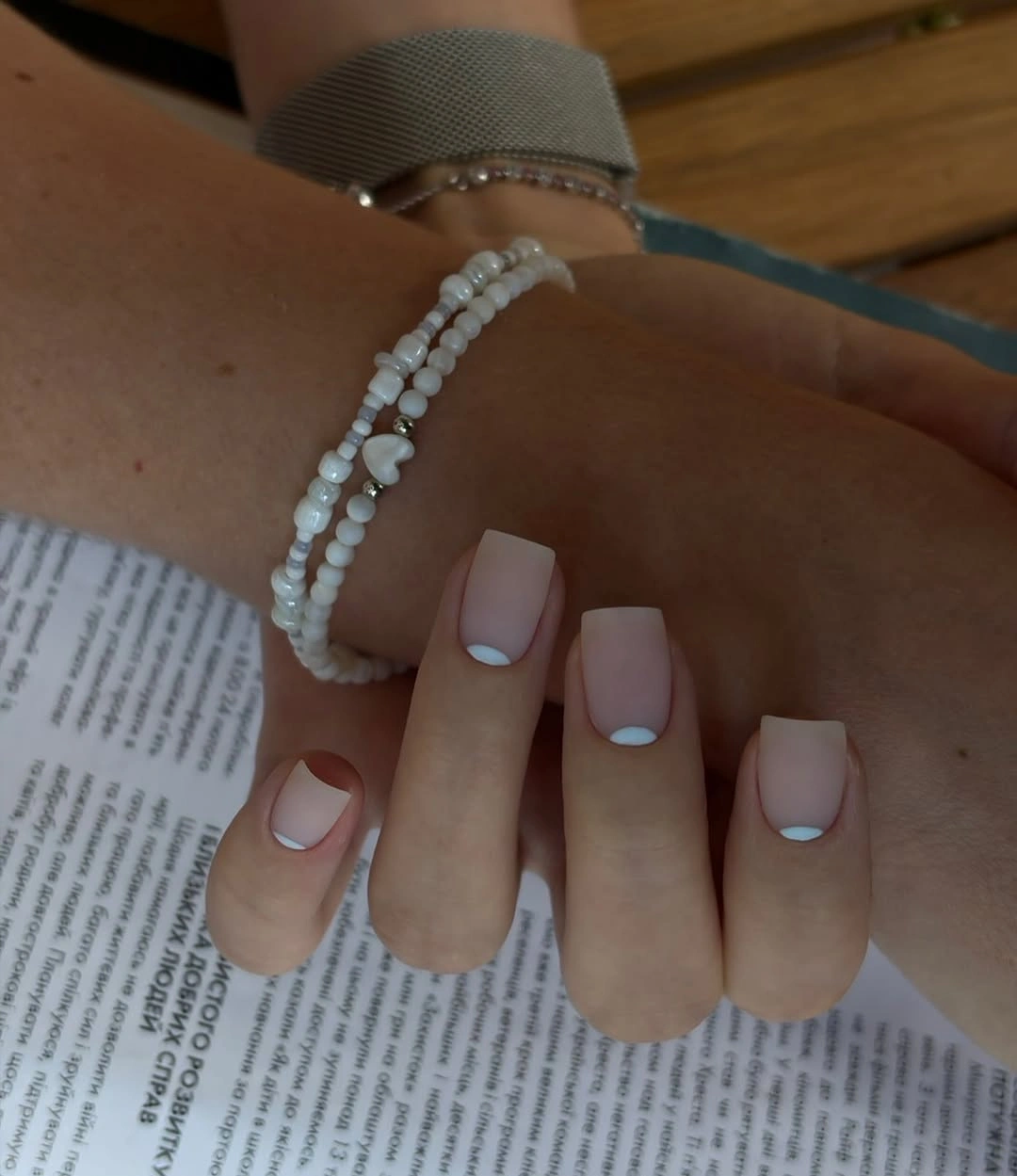 Pale blush square nails with cool blue lilac tips
