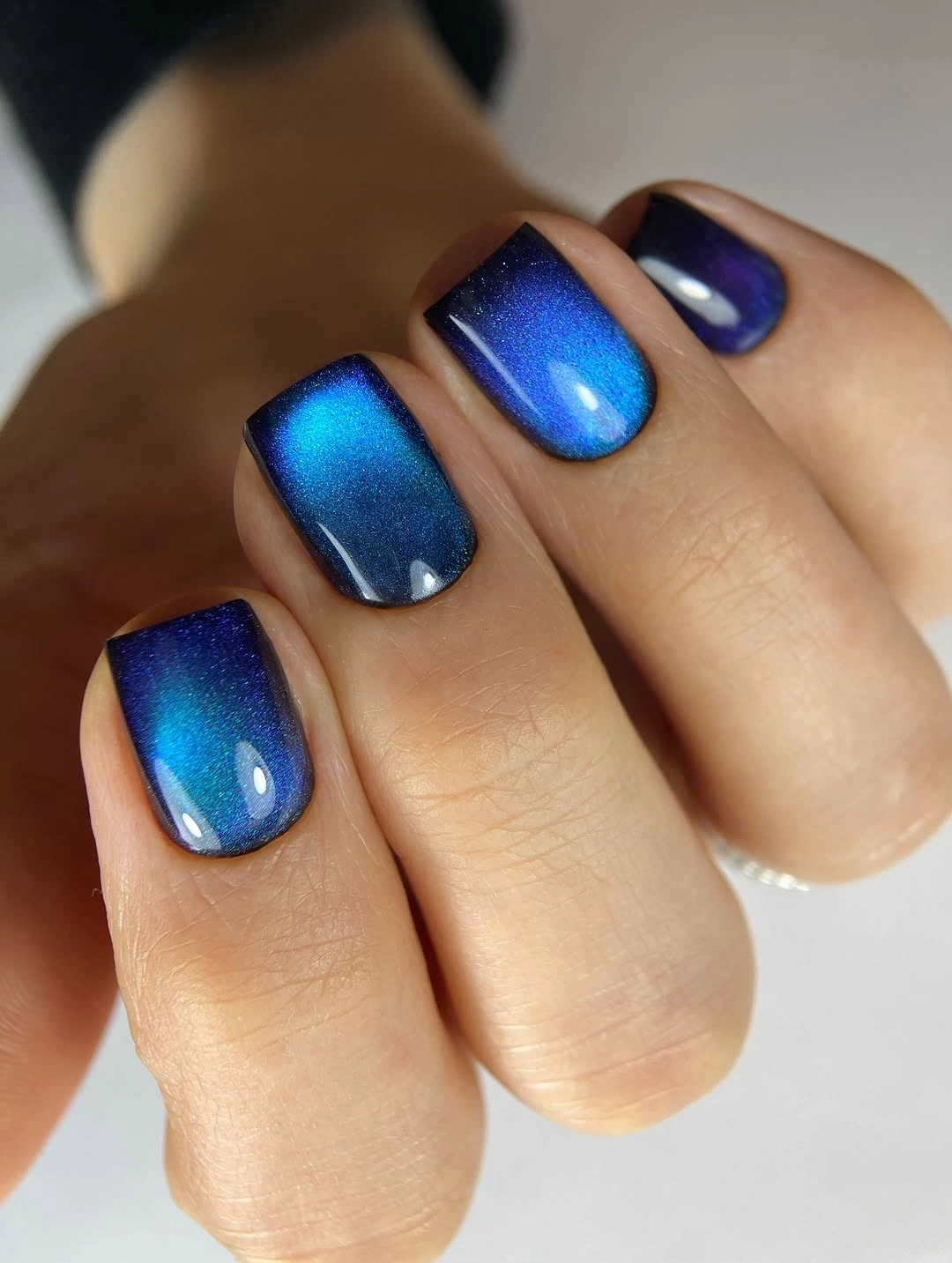 Deep blue square nails with vivid electric reflective shimmer