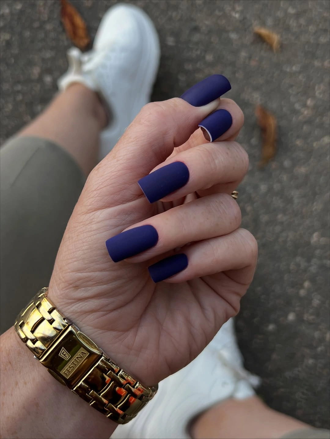 Matte-looking cobalt blue square nails on a medium length