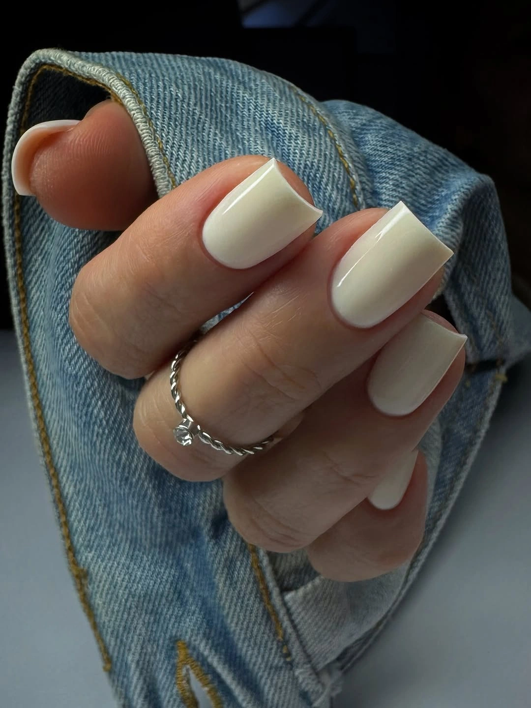 Creamy off white short square nails with rounded corners