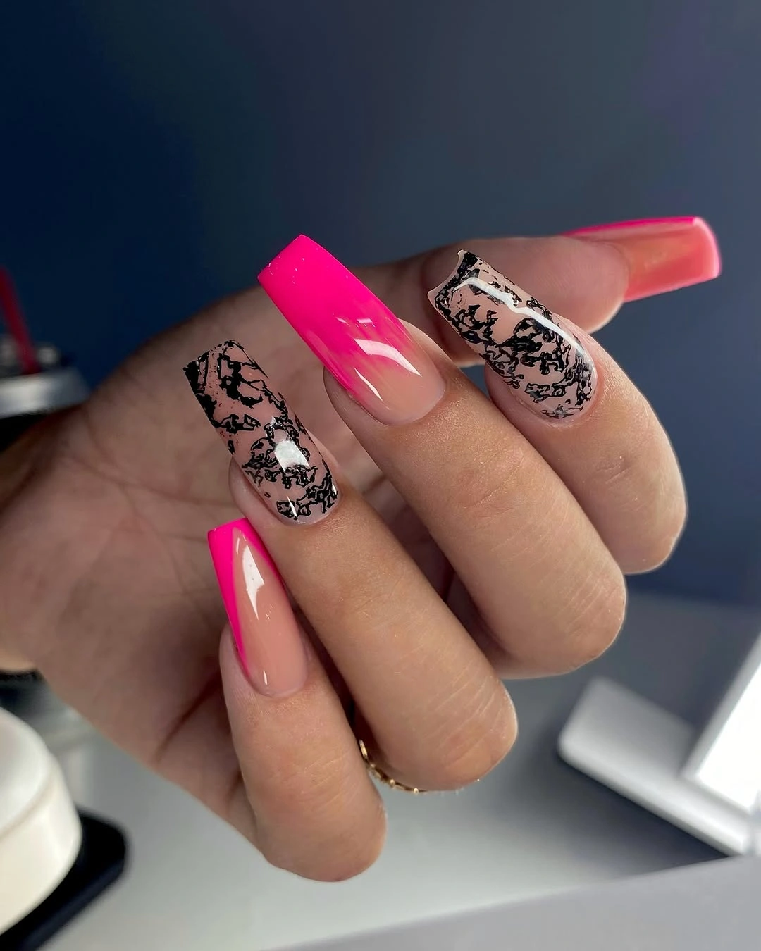 Electric pink square nails with black white animal print