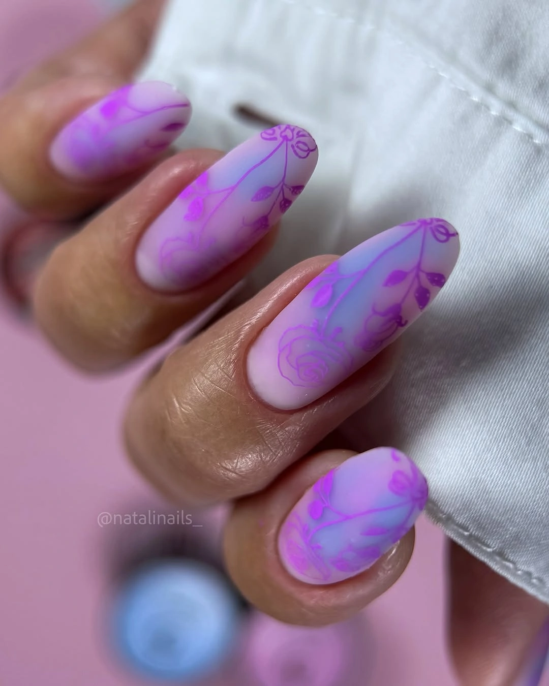 Medium almond lilac nails with purple floral linework