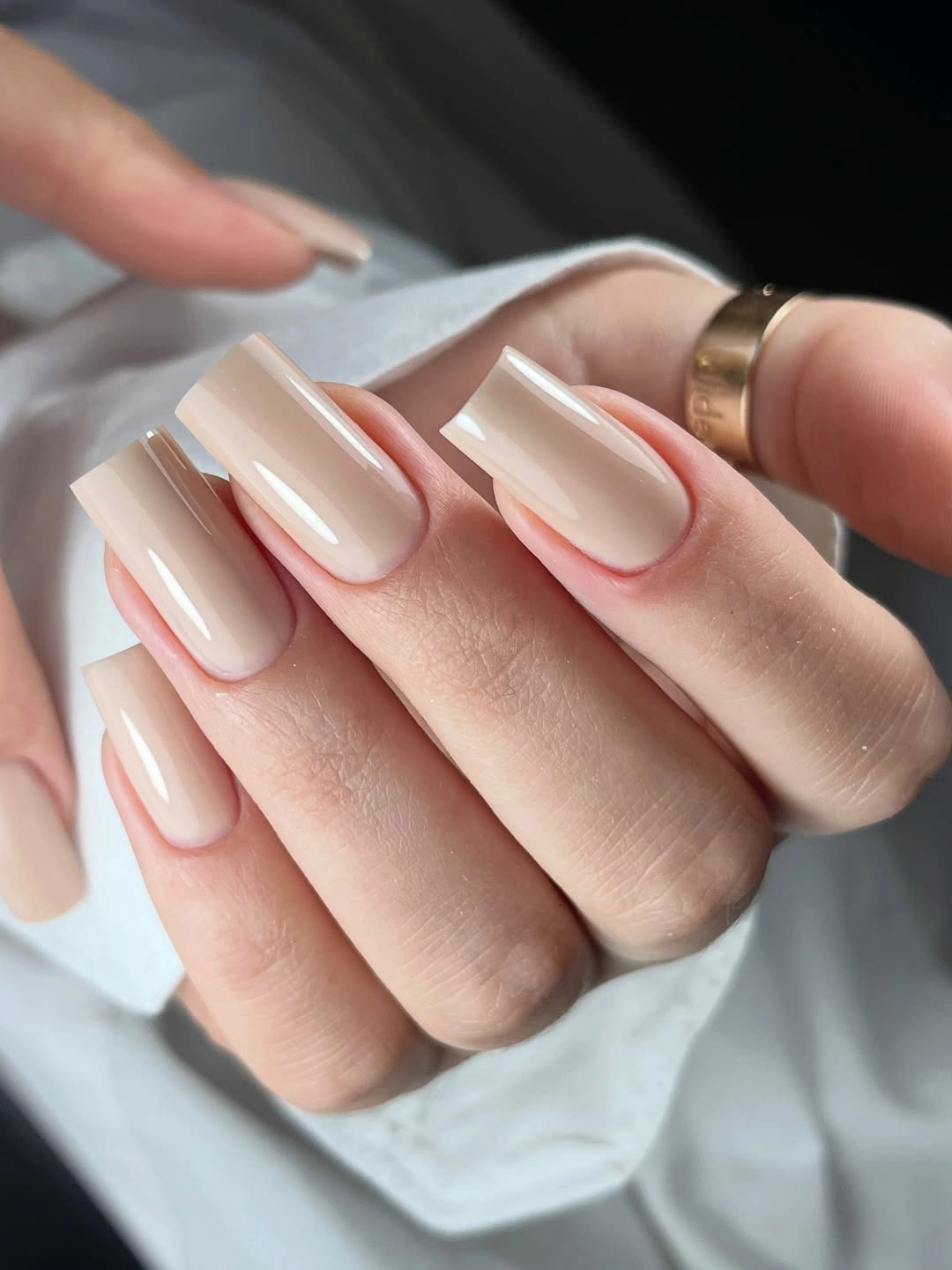 pale nude nails with crisp white and red contour accents