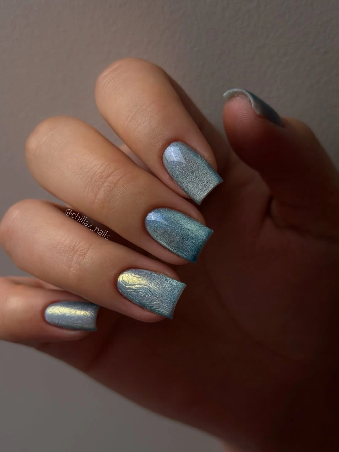 medium square nails with blue and silver textured shimmer