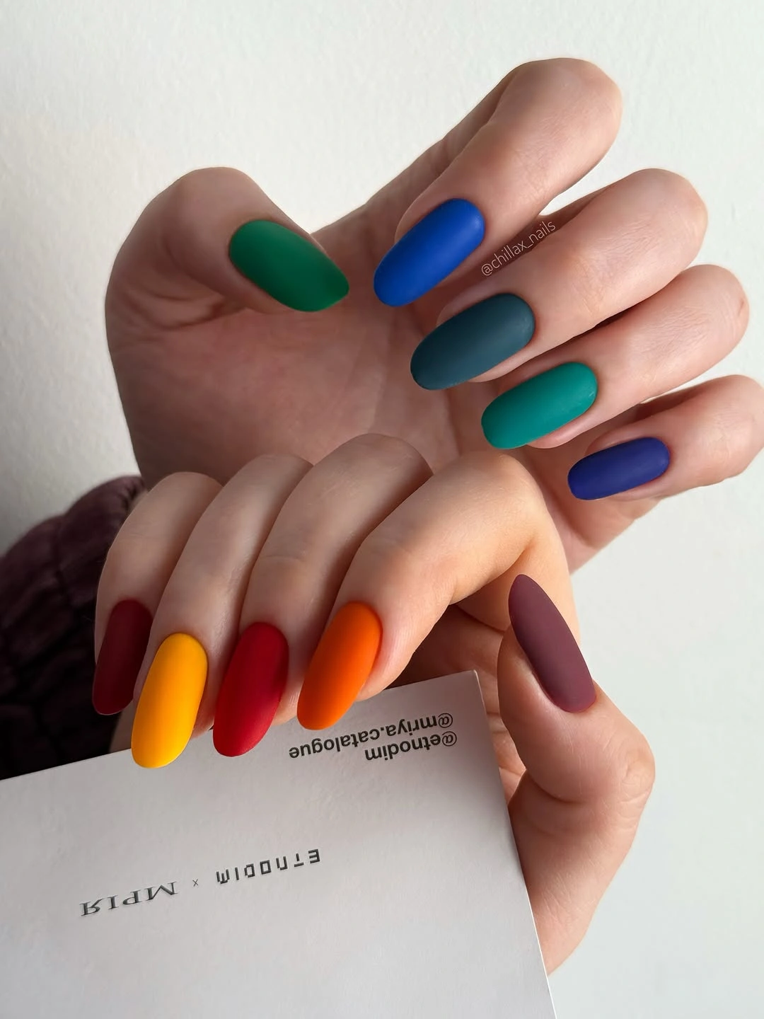 medium nails mixing bold green blue orange red and purple