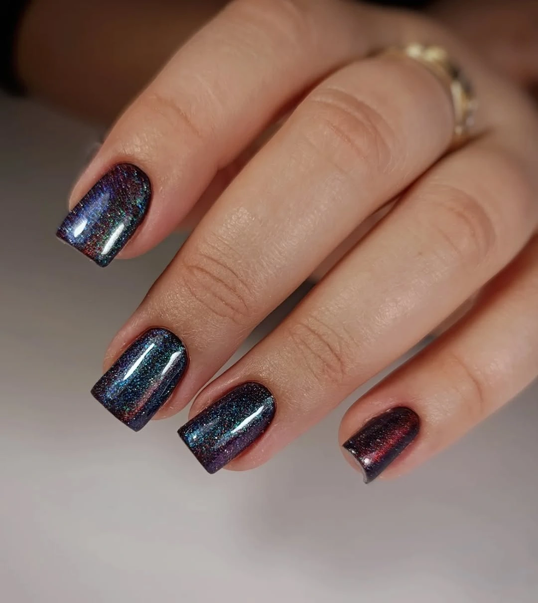 Black square nails with black white zebra-inspired accent panels
