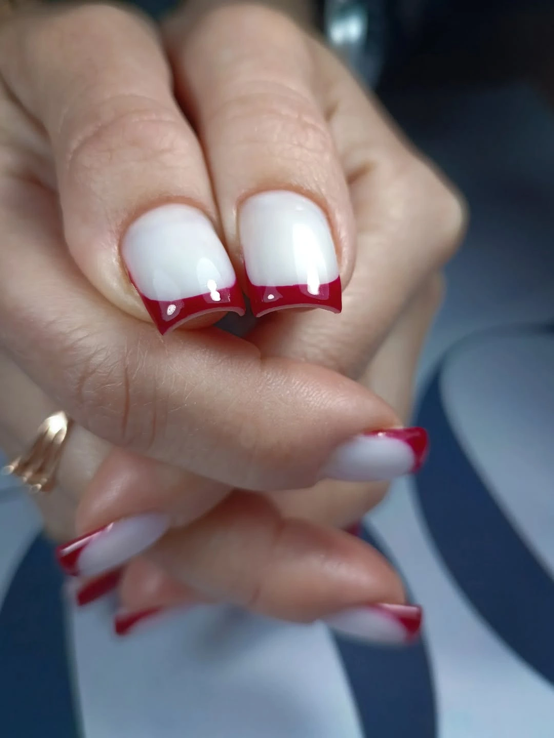 Short square white nails with red French corner tips